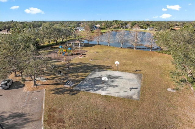 birds eye view of property with a water view