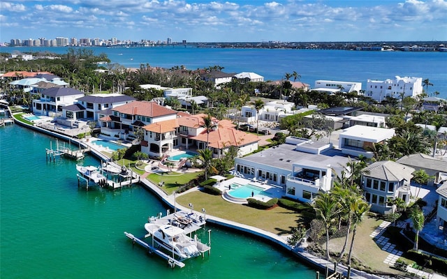 birds eye view of property featuring a water view