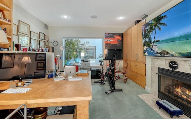 office with a tile fireplace