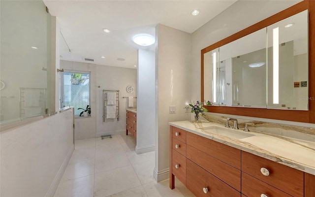 bathroom featuring tile patterned floors and vanity