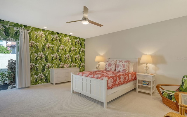 carpeted bedroom with ceiling fan