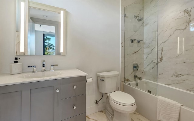 full bathroom with vanity, toilet, and tiled shower / bath combo