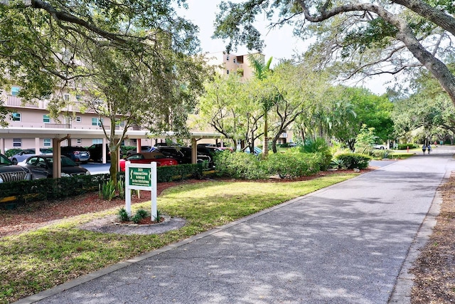 surrounding community featuring a lawn