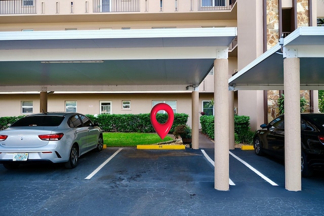 view of car parking with a carport