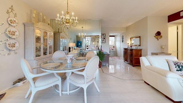 dining area with a chandelier