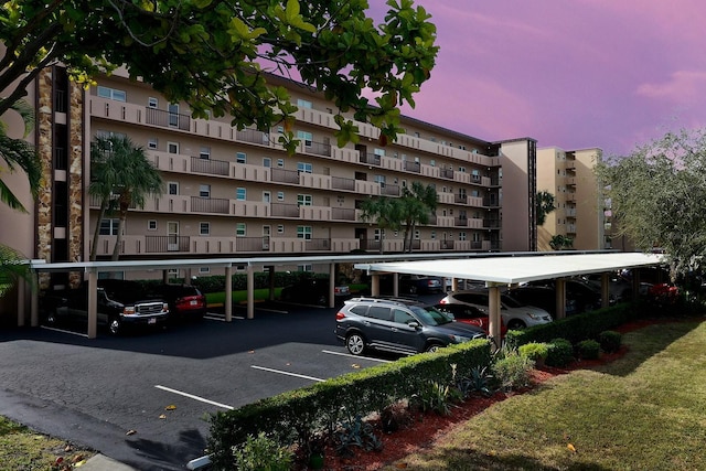 view of outdoor building at dusk