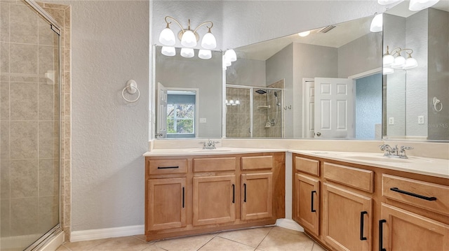 bathroom with double vanity, a sink, visible vents, and a shower stall