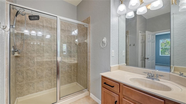 full bath with a textured wall and a shower stall