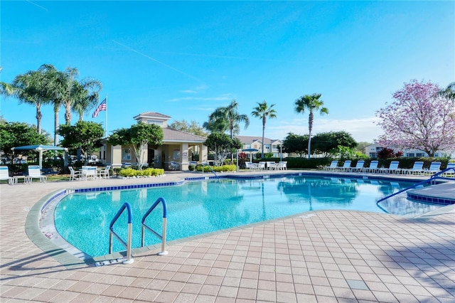 community pool featuring a patio area