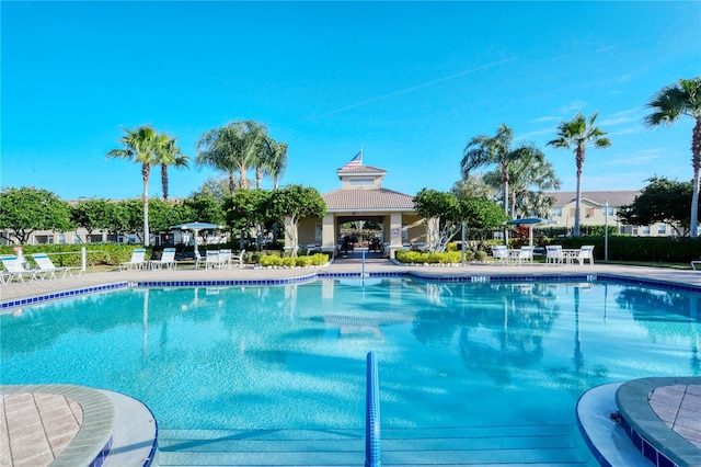 community pool featuring a patio area