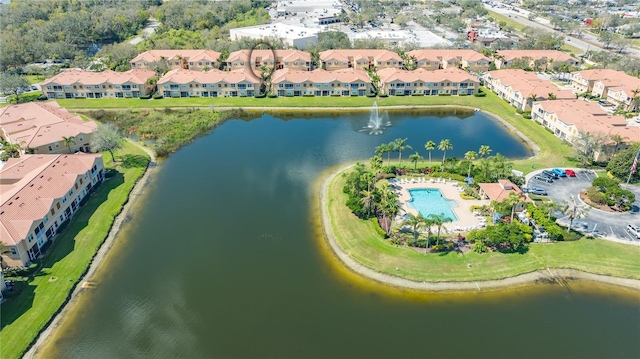 aerial view with a water view and a residential view