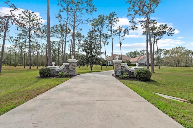 surrounding community featuring a yard