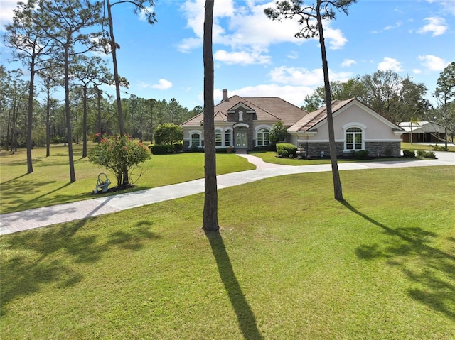 view of front of property with a front lawn