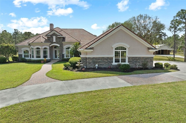 view of front of home with a front lawn