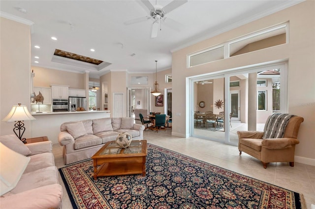 living room featuring light tile patterned floors, crown molding, and a wealth of natural light