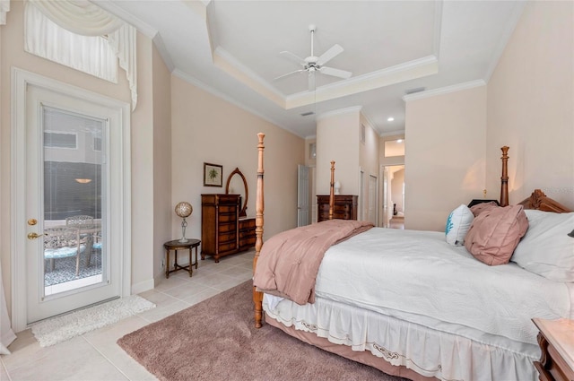 bedroom featuring ornamental molding, access to exterior, light tile patterned floors, and a raised ceiling