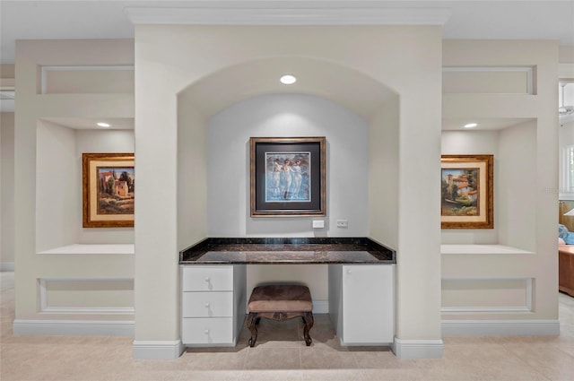 tiled office featuring built in desk