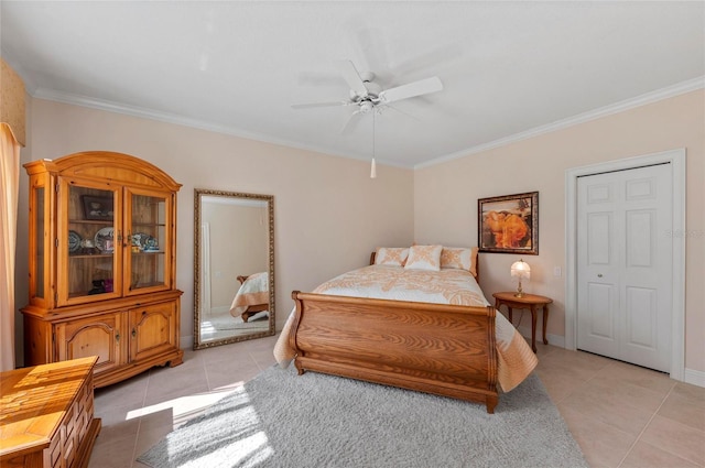 bedroom with crown molding, ceiling fan, and light tile patterned floors