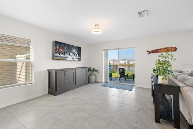 interior space with light tile patterned floors