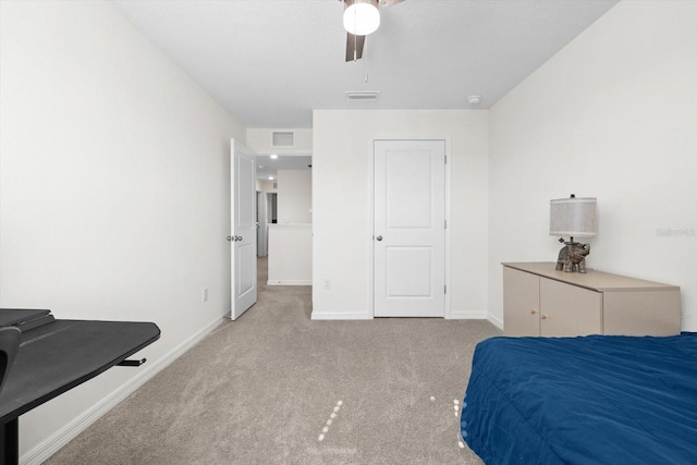 bedroom featuring ceiling fan and light colored carpet