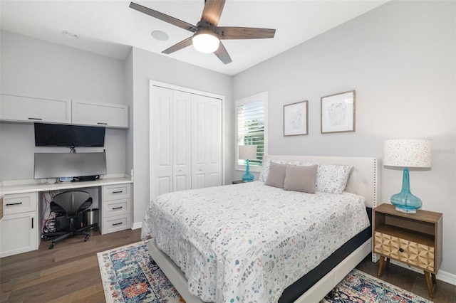 bedroom featuring dark hardwood / wood-style floors, ceiling fan, and a closet