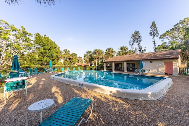 pool with a patio