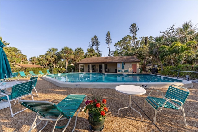 pool featuring a patio area