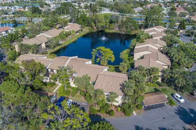 bird's eye view with a residential view and a water view