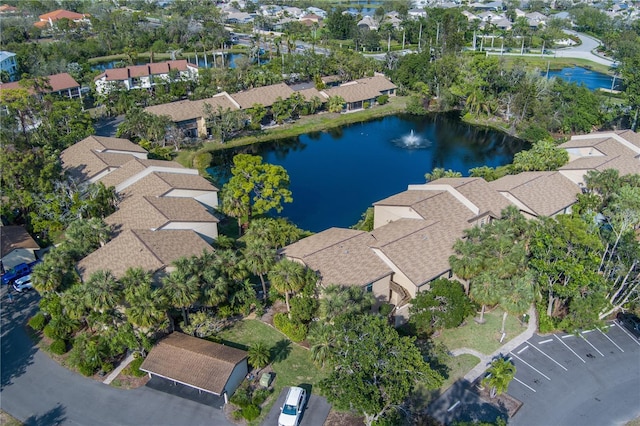 aerial view featuring a residential view and a water view