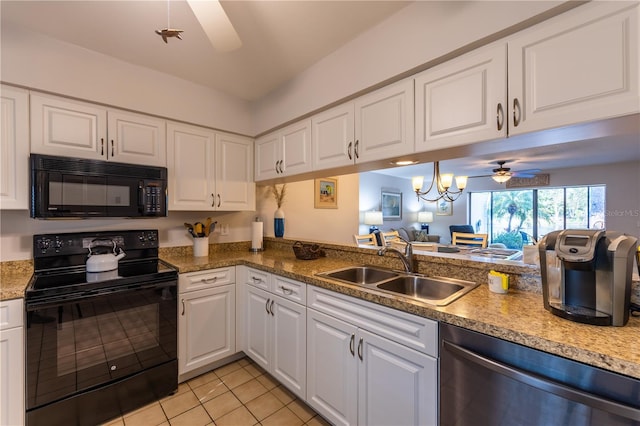 kitchen with black appliances, ceiling fan with notable chandelier, light tile patterned flooring, white cabinetry, and a sink