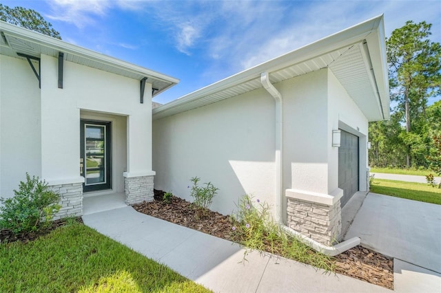 property entrance with a garage