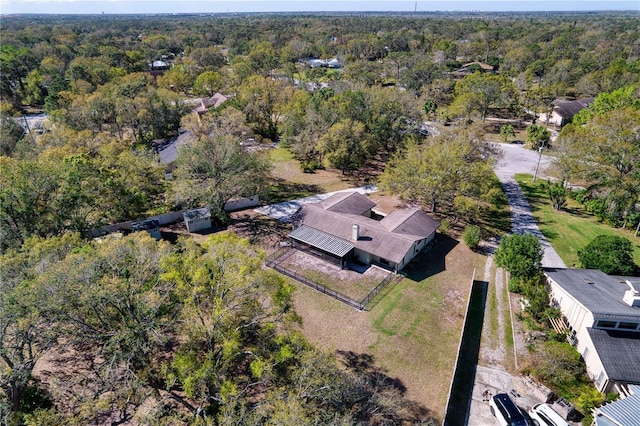 bird's eye view featuring a view of trees