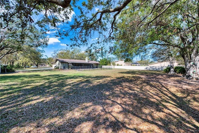 view of yard featuring fence