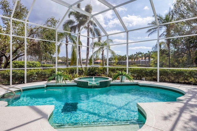 view of pool featuring a pool with connected hot tub and glass enclosure