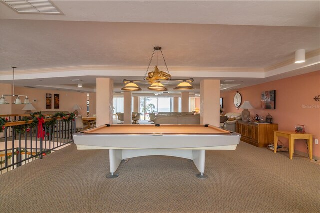 recreation room with crown molding, a tray ceiling, carpet floors, and billiards