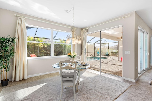 dining area featuring an inviting chandelier