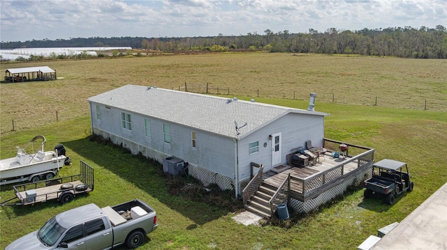 birds eye view of property with a rural view