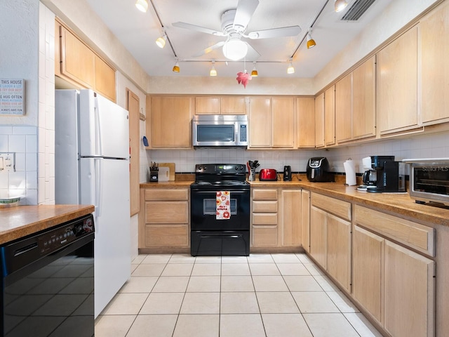 kitchen with backsplash, light tile patterned floors, ceiling fan, black appliances, and light brown cabinets