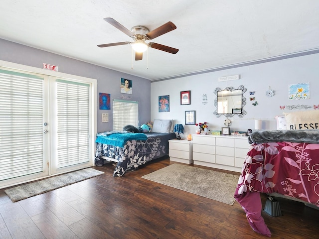 bedroom featuring dark wood-type flooring, access to exterior, and ceiling fan