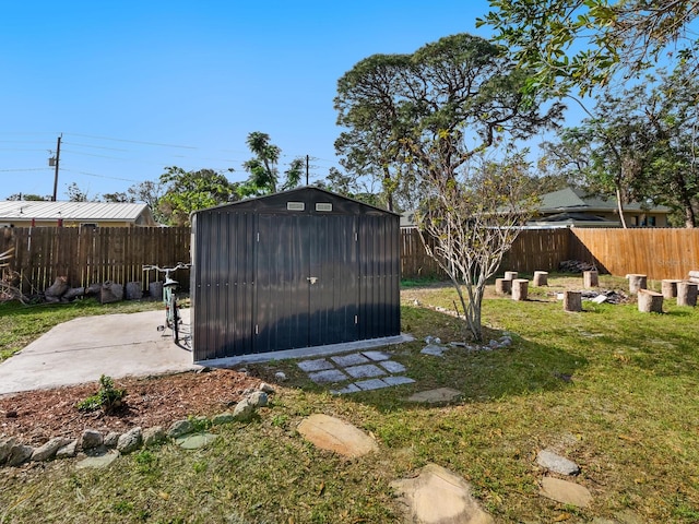 view of outbuilding with a lawn