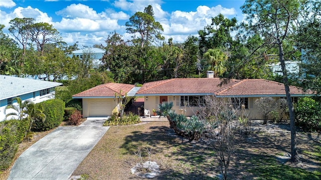 1555 Flower Dr, Sarasota, FL 34239 - view of front of house featuring a garage
