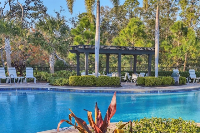 view of pool with a pergola