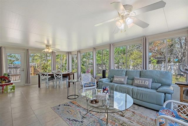 sunroom / solarium with ceiling fan