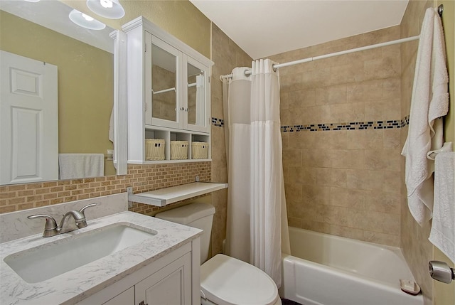 full bathroom featuring vanity, toilet, shower / tub combo, and decorative backsplash