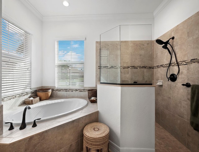 bathroom with crown molding and shower with separate bathtub