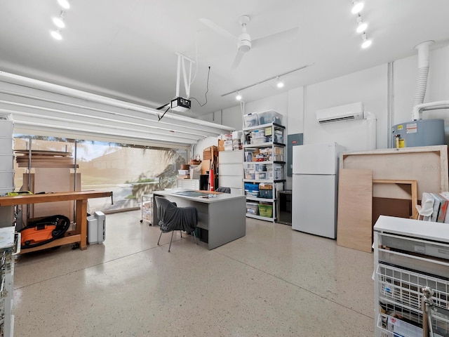 garage with white refrigerator, fridge, a garage door opener, and a wall unit AC