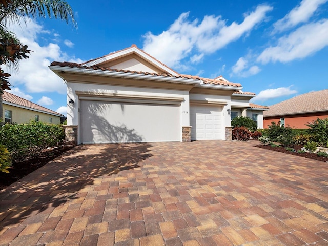 view of front of property featuring a garage