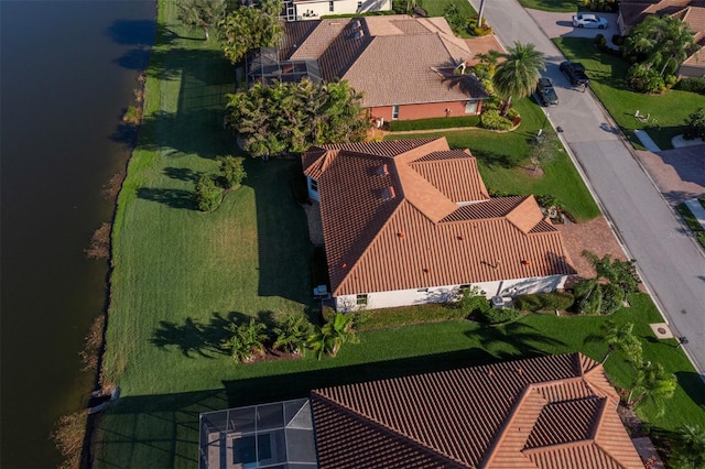 drone / aerial view with a water view