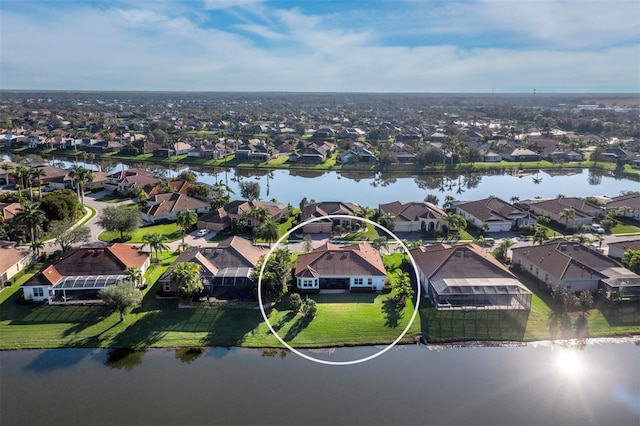 bird's eye view with a water view