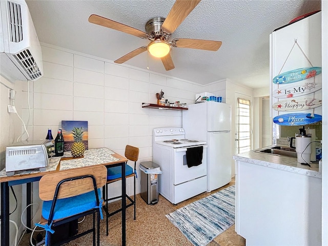 kitchen with white appliances, a wall mounted air conditioner, a textured ceiling, open shelves, and a sink